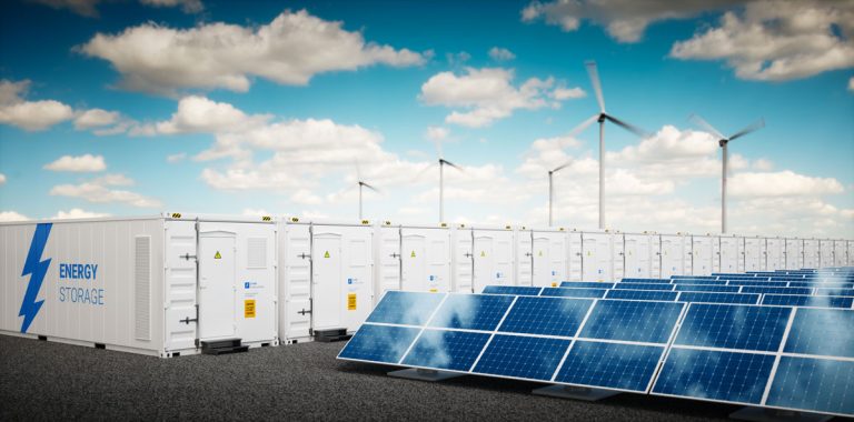solar panels next to band of batteries for energy storage